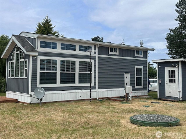 20 Golden Sands Pl, Sequim, WA 98382 - rear view of property with a lawn