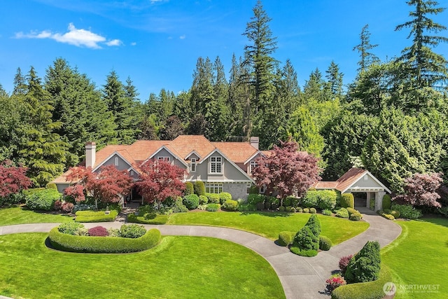 24817 NE 20th St, Sammamish, WA 98074 - view of front of property featuring a front yard and a chimney