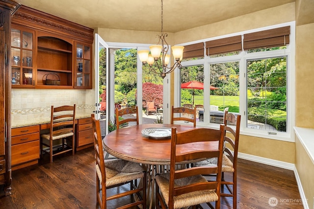 24817 NE 20th St, Sammamish, WA 98074 - dining space with dark wood finished floors, a chandelier, and a desk