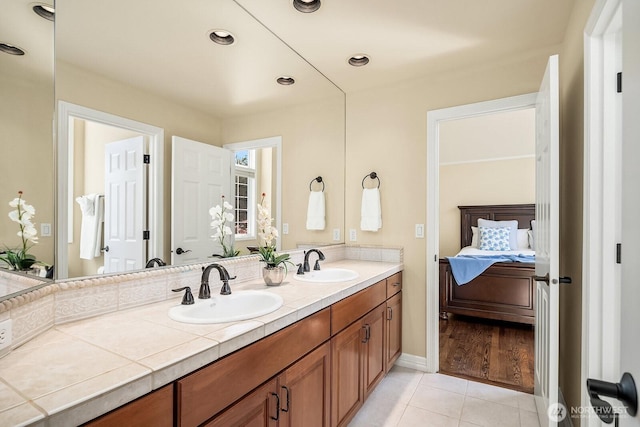 24817 NE 20th St, Sammamish, WA 98074 - ensuite bathroom featuring double vanity and tile patterned floors