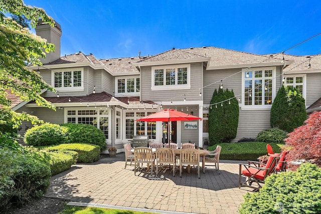 24817 NE 20th St, Sammamish, WA 98074 - rear view of house with a patio area