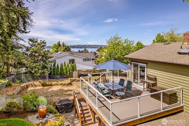 10218 NE 65th St, Kirkland, WA 98033 - view of patio with outdoor dining area, a deck with water view, and area for grilling