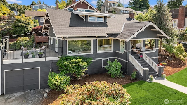 702 34th St, Everett, WA 98201 - view of front of house featuring a shingled roof, covered porch, an attached garage, a chimney, and a front lawn