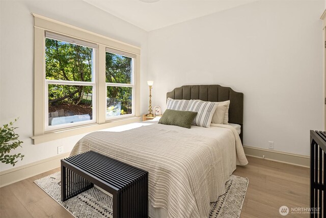 702 34th St, Everett, WA 98201 - bedroom with wood finished floors and baseboards