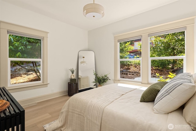 702 34th St, Everett, WA 98201 - bedroom featuring wood finished floors and baseboards