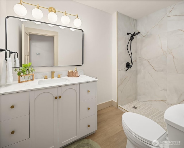 702 34th St, Everett, WA 98201 - full bathroom featuring a marble finish shower, vanity, and wood finished floors