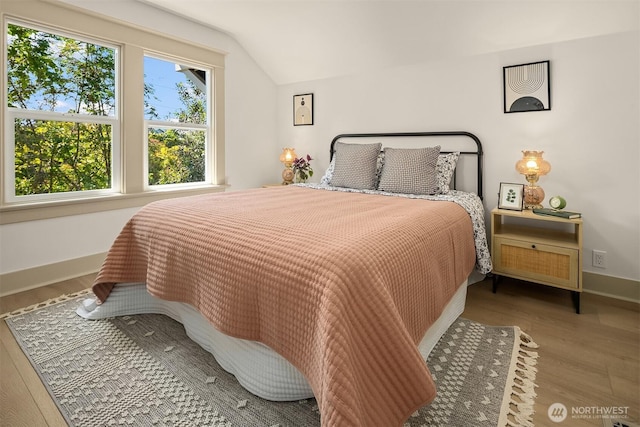 702 34th St, Everett, WA 98201 - bedroom with vaulted ceiling and wood finished floors