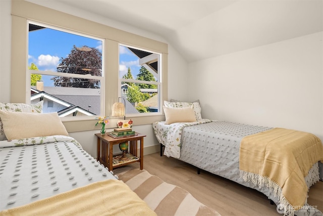 702 34th St, Everett, WA 98201 - bedroom with wood finished floors and vaulted ceiling