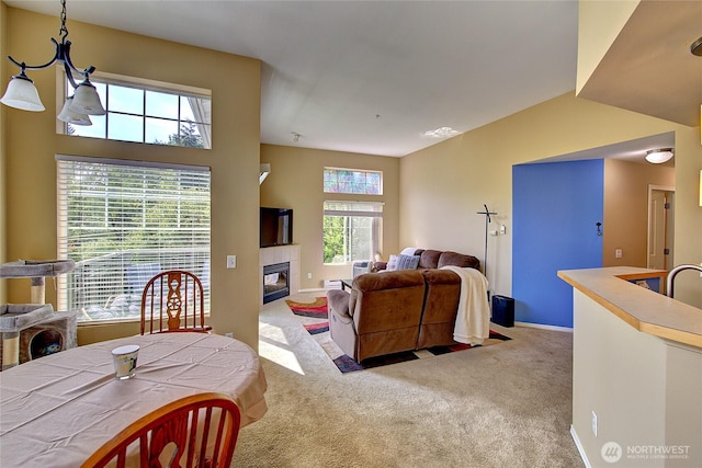14007 69th Dr SE Unit W2, Snohomish, WA 98296 - carpeted living area featuring a fireplace and baseboards