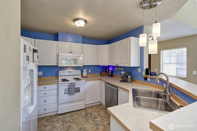 14007 69th Dr SE Unit W2, Snohomish, WA 98296 - kitchen with white appliances, white cabinetry, light countertops, hanging light fixtures, and stone finish flooring