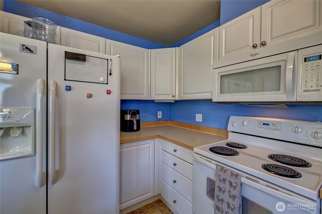 14007 69th Dr SE Unit W2, Snohomish, WA 98296 - kitchen with white appliances, white cabinetry, light countertops, and light tile patterned floors