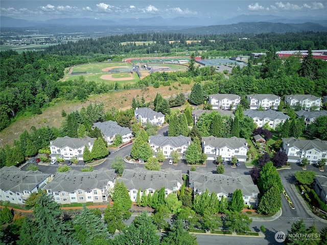 14007 69th Dr SE Unit W2, Snohomish, WA 98296 - aerial overview of property's location with nearby suburban area and a forest