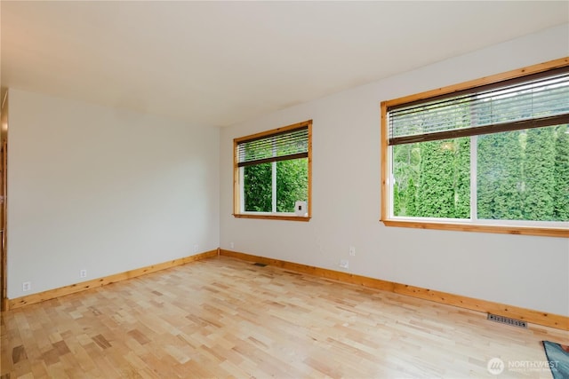 2595 Anderson Hill Rd SW, Port Orchard, WA 98367 - unfurnished room featuring wood finished floors and baseboards