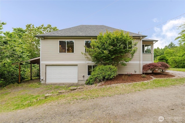 2595 Anderson Hill Rd SW, Port Orchard, WA 98367 - view of front of house with dirt driveway and a garage