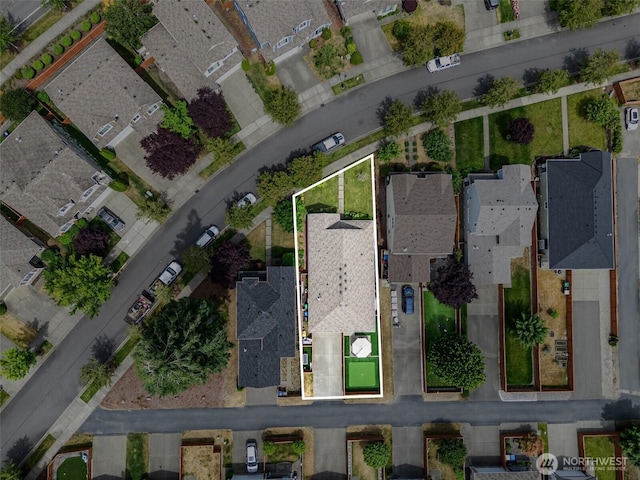 9127 Periwinkle Loop NE, Olympia, WA 98516 - aerial overview of property's location with property boundaries highlighted and nearby suburban area