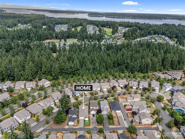 9127 Periwinkle Loop NE, Olympia, WA 98516 - aerial view of property's location with nearby suburban area and a nearby body of water