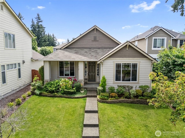 9127 Periwinkle Loop NE, Olympia, WA 98516 - view of front facade featuring roof with shingles and a front lawn