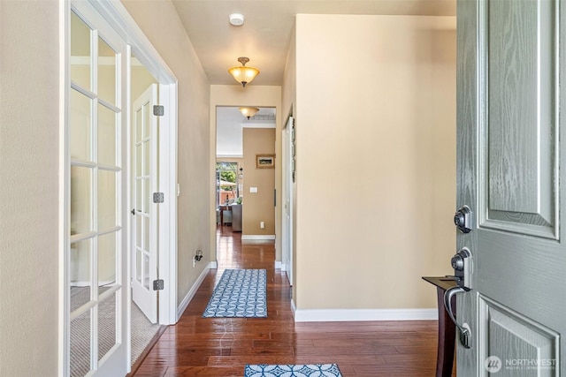 9127 Periwinkle Loop NE, Olympia, WA 98516 - entryway featuring wood finished floors and baseboards