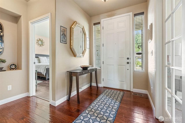 9127 Periwinkle Loop NE, Olympia, WA 98516 - entryway with dark wood-style flooring and baseboards