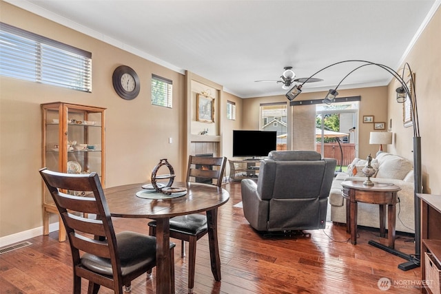 9127 Periwinkle Loop NE, Olympia, WA 98516 - dining room featuring ornamental molding, a ceiling fan, and hardwood / wood-style flooring