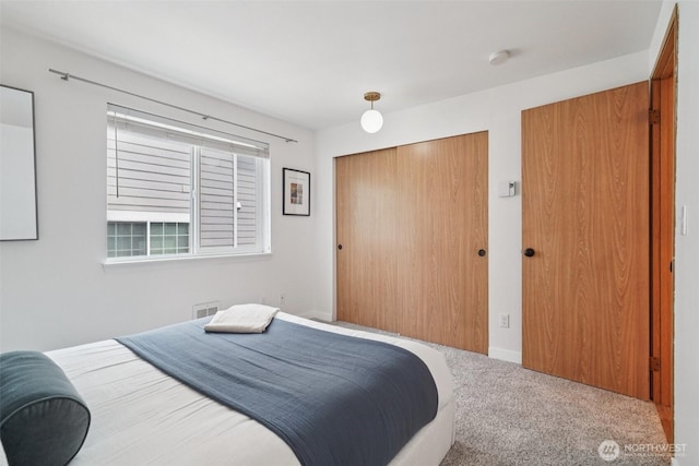 7000 Cleopatra Pl NW Unit 303, Seattle, WA 98117 - bedroom featuring carpet flooring