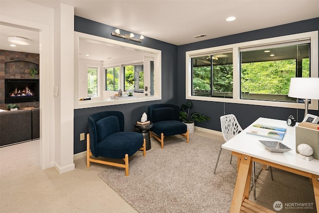 9201 24th Ave NW, Seattle, WA 98117 - office area featuring carpet flooring and a large fireplace