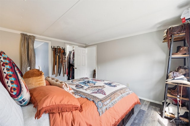 725 37th St SE Unit 36, Auburn, WA 98002 - bedroom featuring crown molding and wood finished floors