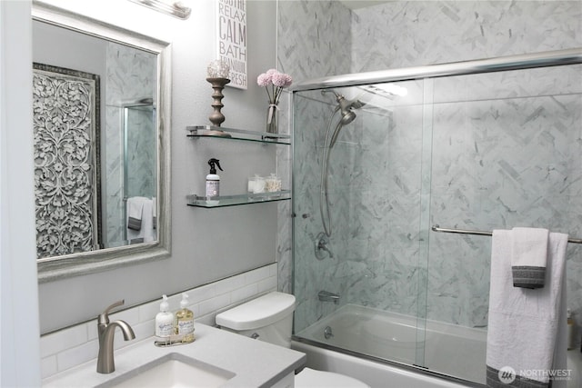 2010 Waverly Pl N, Seattle, WA 98109 - full bath with enclosed tub / shower combo, vanity, and tile walls