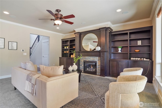 11214 172nd Street Ct E, Puyallup, WA 98374 - carpeted living room with a ceiling fan, recessed lighting, crown molding, a fireplace, and stairway