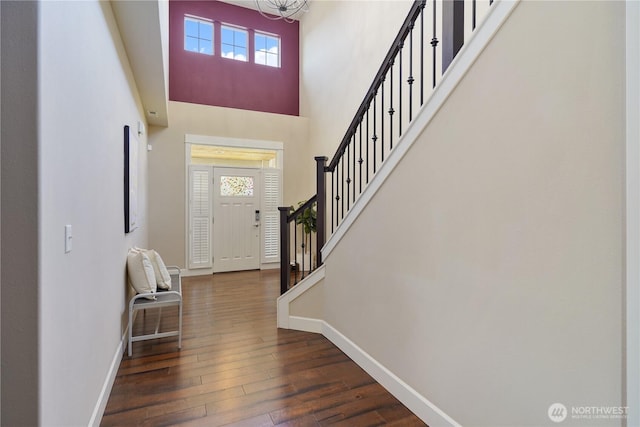 11214 172nd Street Ct E, Puyallup, WA 98374 - entrance foyer featuring stairs, dark wood-style flooring, a chandelier, and a towering ceiling