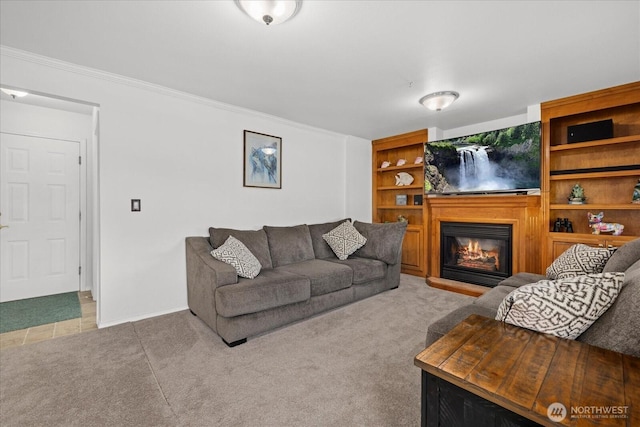 32421 Whitman Lake Dr E, Graham, WA 98338 - carpeted living room with a glass covered fireplace and ornamental molding