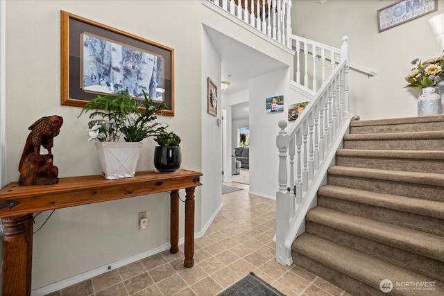 32421 Whitman Lake Dr E, Graham, WA 98338 - staircase featuring baseboards