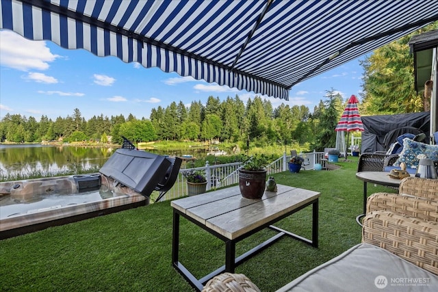32421 Whitman Lake Dr E, Graham, WA 98338 - view of green lawn with a water view, outdoor dining space, and a view of trees