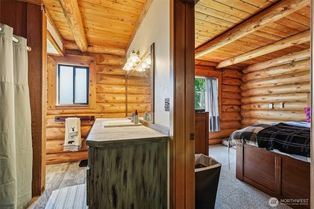 8209 271st Ave E, Buckley, WA 98321 - bedroom featuring a wood ceiling with exposed beams, log walls, and wood-type flooring