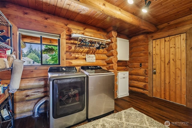8209 271st Ave E, Buckley, WA 98321 - laundry area featuring independent washer and dryer, cabinet space, log walls, dark wood-style flooring, and wood ceiling