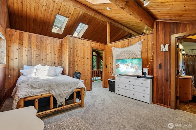 8209 271st Ave E, Buckley, WA 98321 - bedroom featuring wooden walls, carpet floors, a skylight, and wooden ceiling