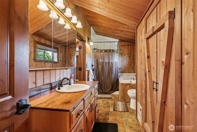 8209 271st Ave E, Buckley, WA 98321 - bathroom featuring lofted ceiling, vanity, wood ceiling, a tub to relax in, and stone finish floors