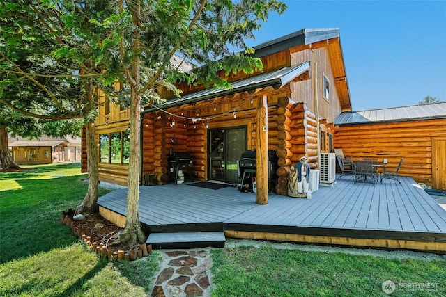 8209 271st Ave E, Buckley, WA 98321 - wooden terrace with a lawn, area for grilling, and outdoor dining area