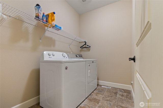 4837 Castleton Rd SW, Port Orchard, WA 98367 - laundry area with washer and dryer and stone finish flooring