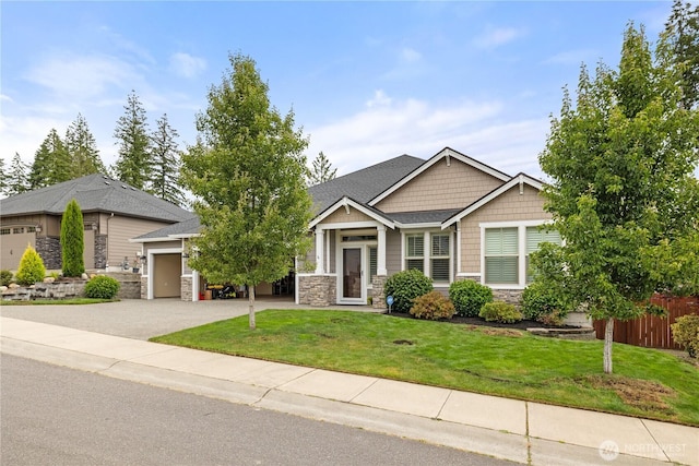 4837 Castleton Rd SW, Port Orchard, WA 98367 - craftsman inspired home with stone siding, an attached garage, and driveway