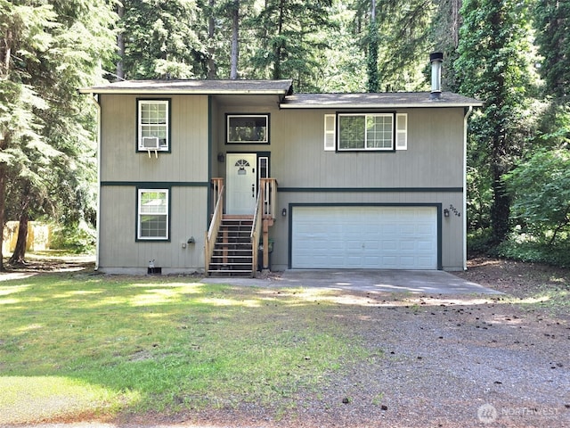 21724 E Terra Ln SE, Yelm, WA 98597 - raised ranch with driveway, a garage, and a front lawn