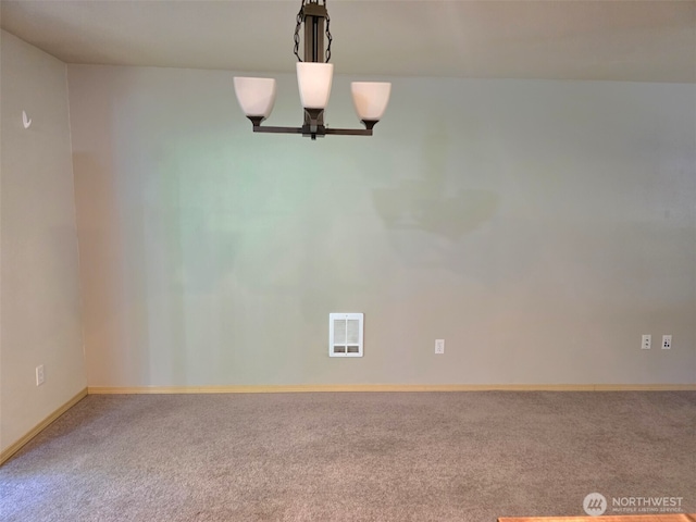21724 E Terra Ln SE, Yelm, WA 98597 - empty room featuring carpet and a chandelier