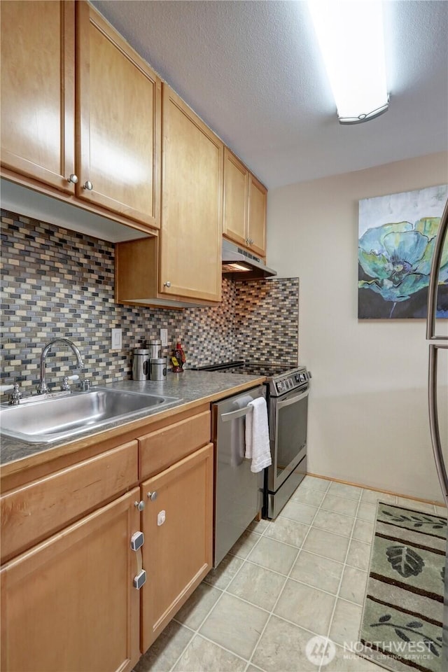 7924 212th St SW Unit 305, Edmonds, WA 98026 - kitchen with under cabinet range hood, dishwasher, range, and decorative backsplash