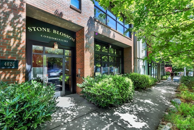 4026 Stone Way N Unit 501, Seattle, WA 98103 - doorway to property featuring brick siding