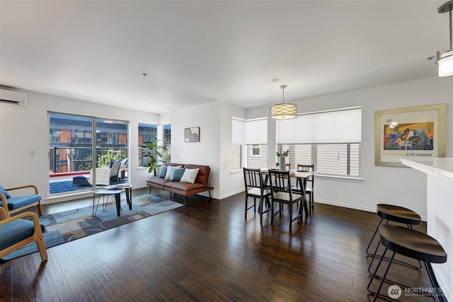 4026 Stone Way N Unit 501, Seattle, WA 98103 - living room with an AC wall unit and wood finished floors