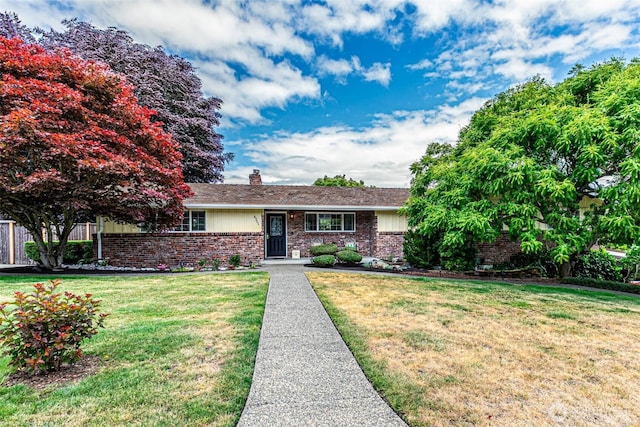 6301 Agnes Rd NE, Tacoma, WA 98422 - ranch-style home featuring brick siding, a front yard, and a chimney