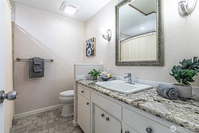 6301 Agnes Rd NE, Tacoma, WA 98422 - bathroom featuring vanity and stone finish flooring