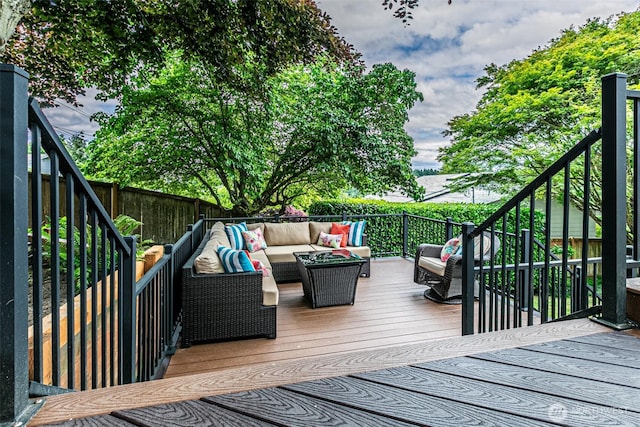 6301 Agnes Rd NE, Tacoma, WA 98422 - wooden terrace with outdoor lounge area and a fenced backyard