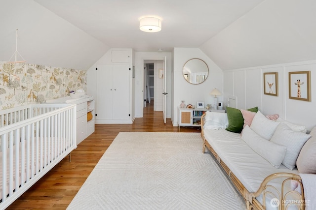 3249 27th Ave W, Seattle, WA 98199 - bedroom featuring wood finished floors and lofted ceiling