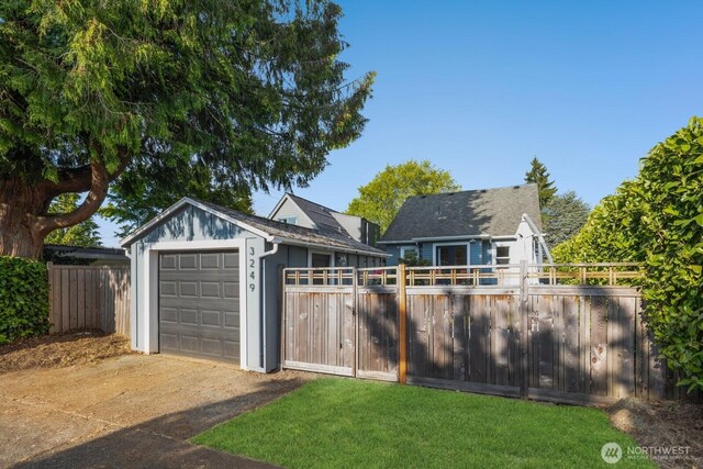 3249 27th Ave W, Seattle, WA 98199 - garage featuring concrete driveway